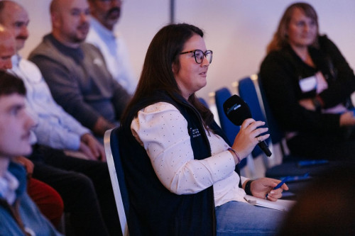 Attendee asking question at Aviagen event